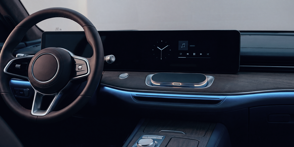 Person sitting on floor working on laptop